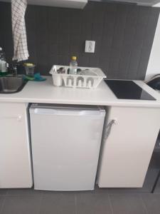 Kuchyň nebo kuchyňský kout v ubytování Stay Sollentuna