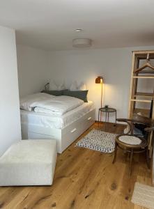 Ένα ή περισσότερα κρεβάτια σε δωμάτιο στο Ferienwohnung in Mühleneck