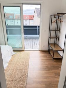 Postel nebo postele na pokoji v ubytování Zentral gelegenes Design-Loft für höchste Ansprüche