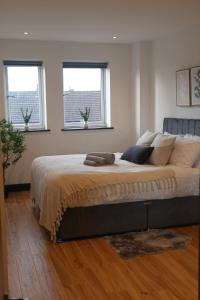 Ένα ή περισσότερα κρεβάτια σε δωμάτιο στο Luxurious Modern 2 Bedroom Apartment with Terrace +22 φωτογραφίες