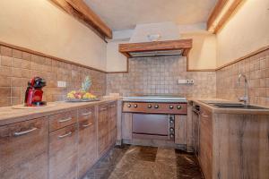 Η κουζίνα ή μικρή κουζίνα στο Luxury Chalet Martin