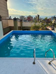 Bazén v ubytování Rent Apart San Lorenzo nebo v jeho okolí