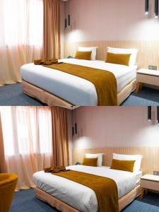 ZradnaにあるThemirellのホテルルームのベッド2台の写真2枚