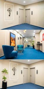 ZradnaにあるThemirellの青いカーペットが敷かれた部屋のあるロビー