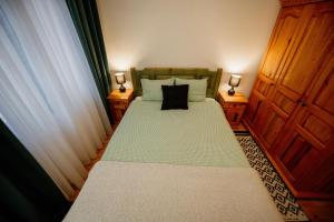 Ένα ή περισσότερα κρεβάτια σε δωμάτιο στο Sunny Hill kuća za odmor na Zlataru