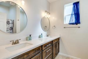 a bathroom with a sink and a mirror at Hike and Ski! Home with Dog-Friendly Yard in Eagar in Eagar +22 photos