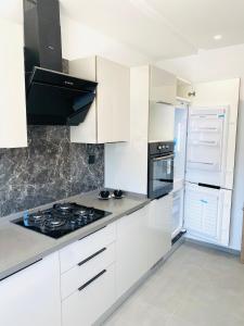 Kuchyň nebo kuchyňský kout v ubytování Cocon chic + 11 fotografií