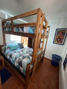 En eller flere senge i et værelse på Mar y Cielo Beach House