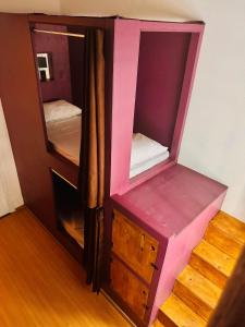 Postel nebo postele na pokoji v ubytování Cocos Hostel Rio