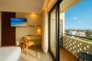 TV a/nebo společenská místnost v ubytování Anaya Hotel Canggu