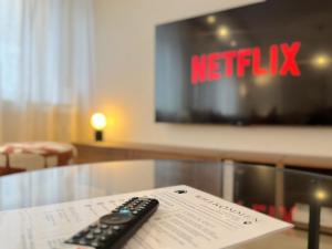 a remote control sitting on top of a table at Seestadt Apartment I Sauna I Parkplatz I Zentral in Haltern +31 photos