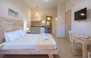 Η κουζίνα ή μικρή κουζίνα στο Omnia Apartments