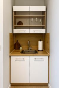 Η κουζίνα ή μικρή κουζίνα στο Twenty2 Apartments