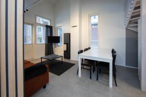 TV a/nebo společenská místnost v ubytování Ski Center Alpine Houses A6