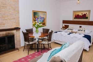 Ένα ή περισσότερα κρεβάτια σε δωμάτιο στο Pousada Medeiros +129 φωτογραφίες