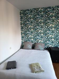 Ένα ή περισσότερα κρεβάτια σε δωμάτιο στο Le studio du cinéma