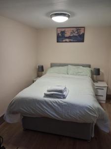 Ένα ή περισσότερα κρεβάτια σε δωμάτιο στο Bedsit in Oldbury