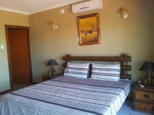 Ένα ή περισσότερα κρεβάτια σε δωμάτιο στο Ballito Vacation Home +46 φωτογραφίες