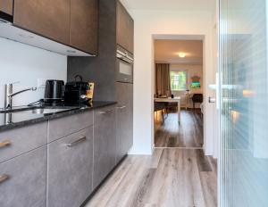 Η κουζίνα ή μικρή κουζίνα στο Stylish Gem +22 φωτογραφίες