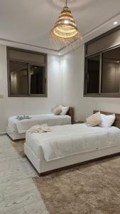 En eller flere senge i et værelse på Appartement for a comfortable holiday