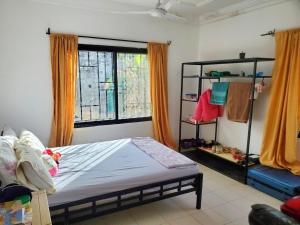 Ένα ή περισσότερα κρεβάτια σε δωμάτιο στο Galan Residence