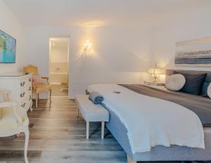 Ένα ή περισσότερα κρεβάτια σε δωμάτιο στο Heaven Retreat