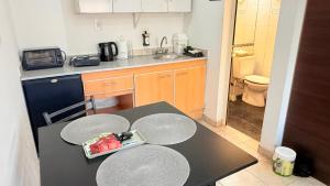 Kuchyň nebo kuchyňský kout v ubytování G7 Confortable Monoambiente Triple con Cochera + 7 fotografií