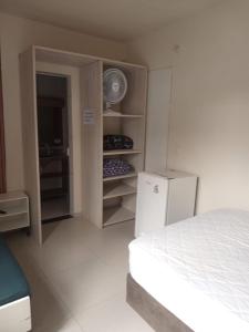 Voodi või voodid majutusasutuse Apartamento bem localizado toas