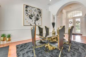 a dining room with a table and chairs at Edwards' Palace in Panama City Beach