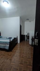 Postel nebo postele na pokoji v ubytování Ciudad Vieja stays