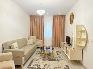 Et opholdsområde på Aparthotel Rin Grand