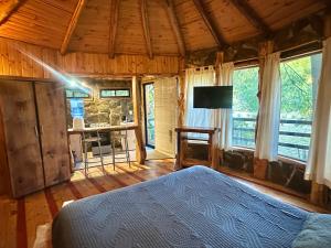 TV a/nebo společenská místnost v ubytování Reserva los Bollenes