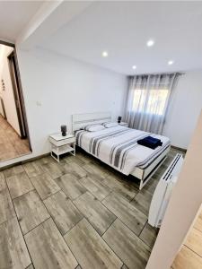 Ένα ή περισσότερα κρεβάτια σε δωμάτιο στο GuestHouse dos Limites