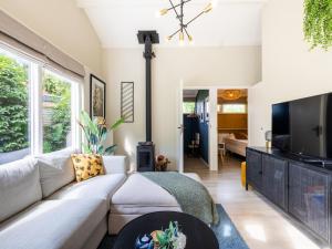 TV a/nebo společenská místnost v ubytování Kolibrie + 11 fotografií