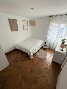 Ένα ή περισσότερα κρεβάτια σε δωμάτιο στο Le Glow - Élégant - Paisible - Parking