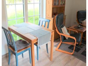 Un lugar para sentarse en Ferienwohnung am Deich in Burhave