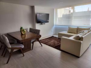 Et tv og/eller underholdning på 15 Súper Loft con Aire Acondicionado, Consulado