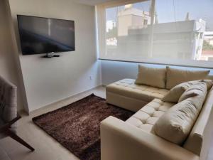 Et tv og/eller underholdning på 15 Súper Loft con Aire Acondicionado, Consulado