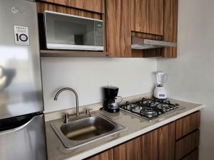 Køkken eller tekøkken på 15 Súper Loft con Aire Acondicionado, Consulado