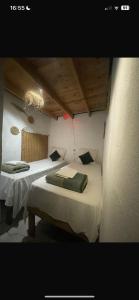 a room with two beds in a room at TAMRI BEACH HOUSE in Tamri