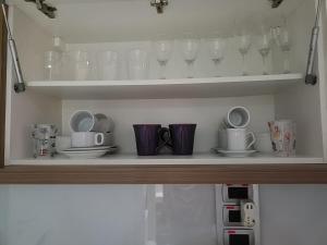 Nhà bếp/bếp nhỏ tại Monoambiente en Green Park Solanas Punta del este +21 ảnh