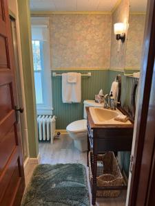 a bathroom with a sink and a toilet at Welcome to Duck Run in Mackeyville, Pennsylvania! in Mill Hall