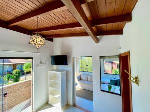 TV a/nebo společenská místnost v ubytování Pousada Mirante Dom Pedro