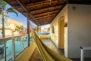 Πισίνα στο ή κοντά στο Hostel Guarapari