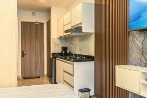 Kuchyň nebo kuchyňský kout v ubytování NUEVO!! loft de LUJO en El Rodadero a pasos de la playa