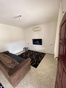 TV a/nebo společenská místnost v ubytování Casa com piscina em Mongaguá - 400m da praia II + 10 fotografií