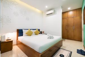 Ένα ή περισσότερα κρεβάτια σε δωμάτιο στο Adventure Hotel