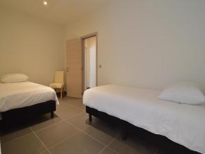 Ένα ή περισσότερα κρεβάτια σε δωμάτιο στο Holiday home in Zottegem