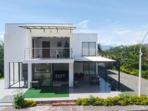 a rendering of a house with a balcony at Casa Lili in Sopetrán