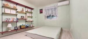 Postel nebo postele na pokoji v ubytování Hago Guest House + 135 fotografií